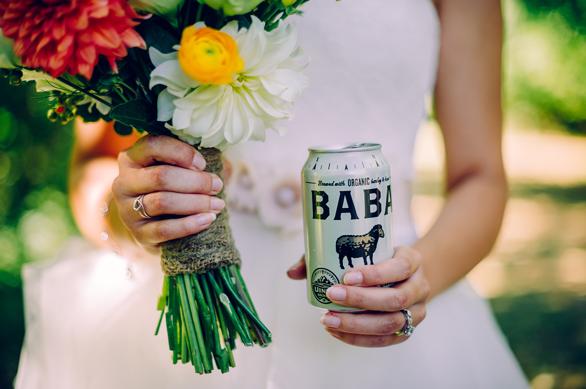 bride with bouquet and beer