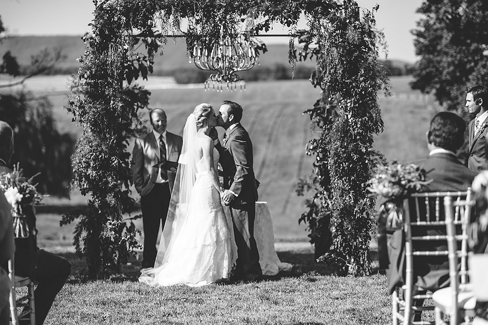 farm wedding ceremony first kiss