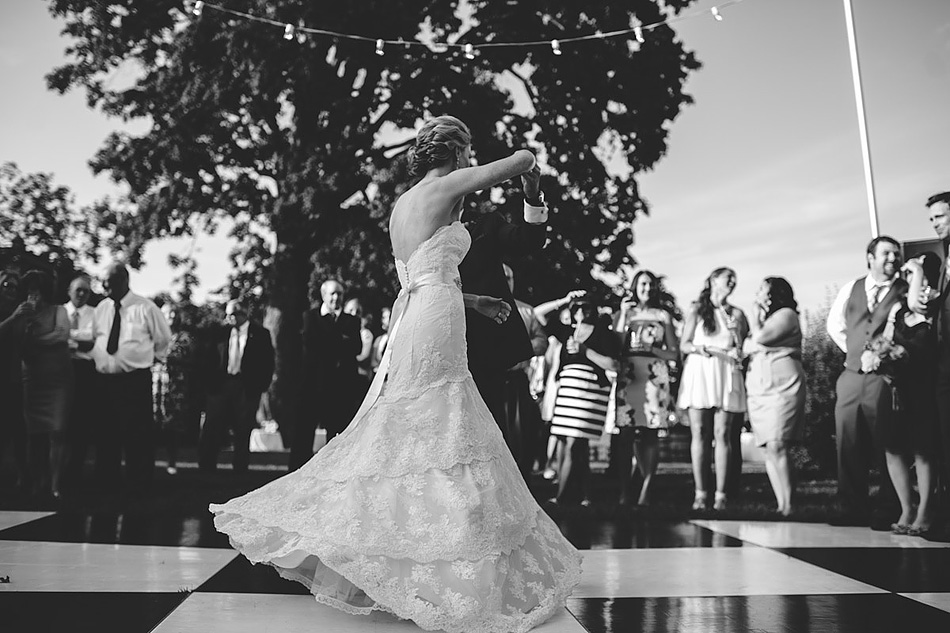 beautiful first dance twirl black and white wedding photojournalism