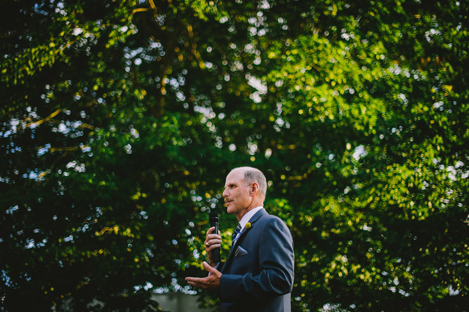 outdoor wedding reception photo dad speech