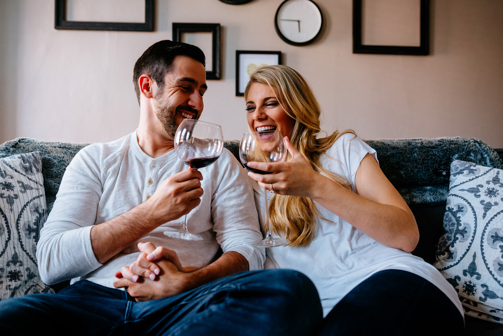 engagement portraits with wine at home