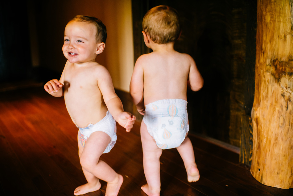 family photos of one year old twins at home