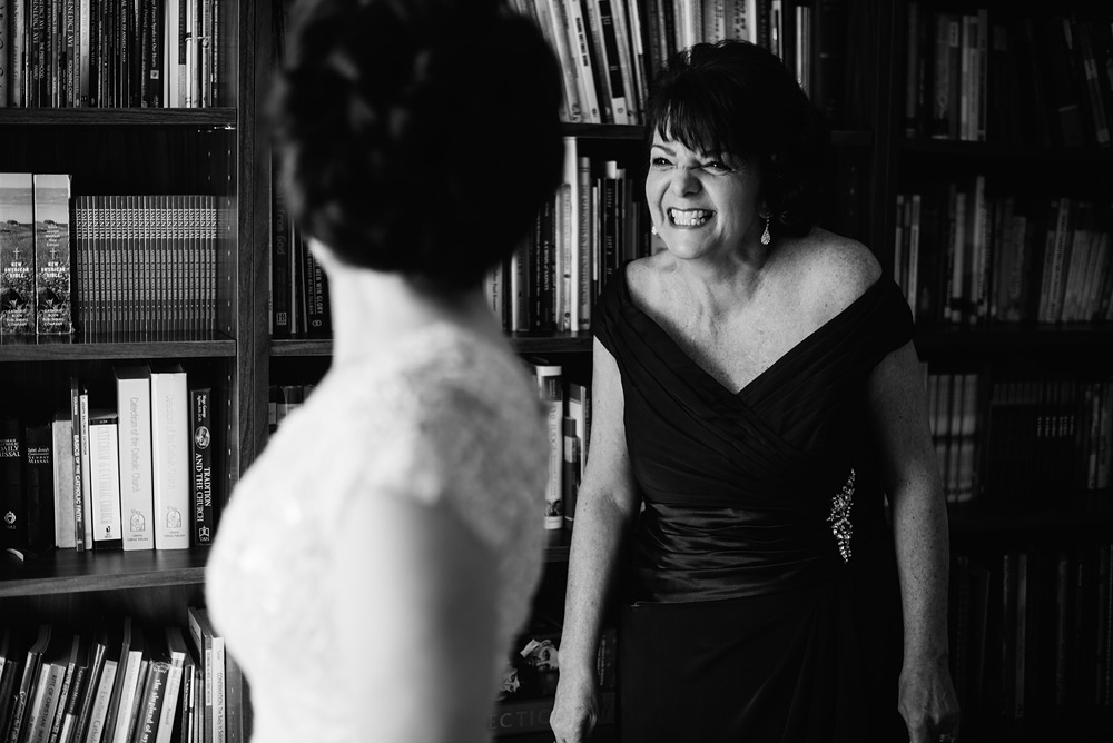 mom smiling at bride wedding candid by best wv wedding photographers the oberports wheeling