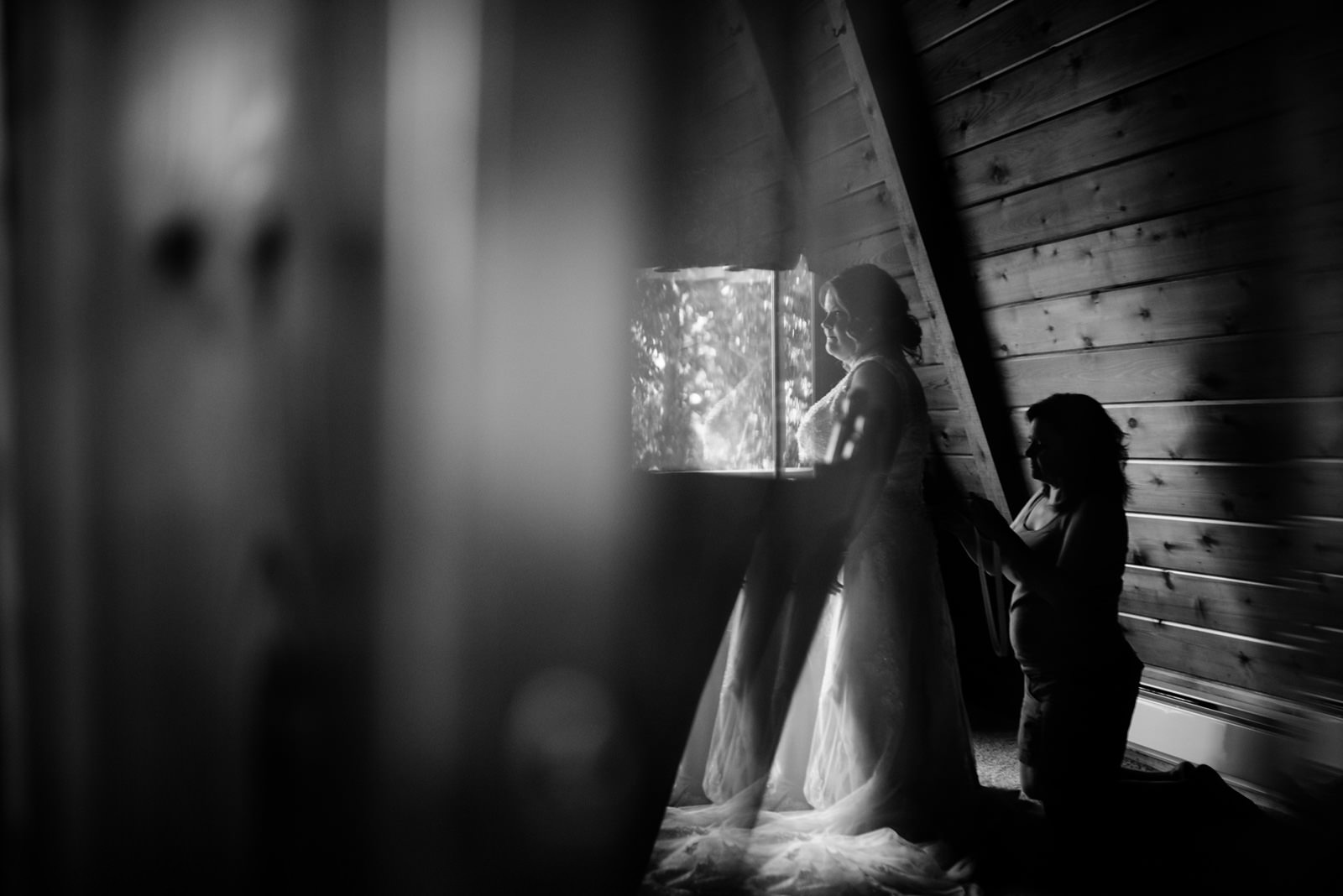 bride putting on wedding dress oberports wv photojournalism