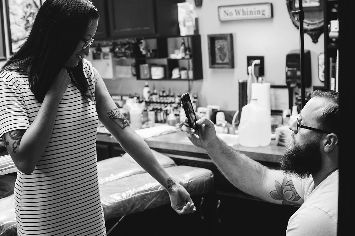 engagement session at tattoo shop