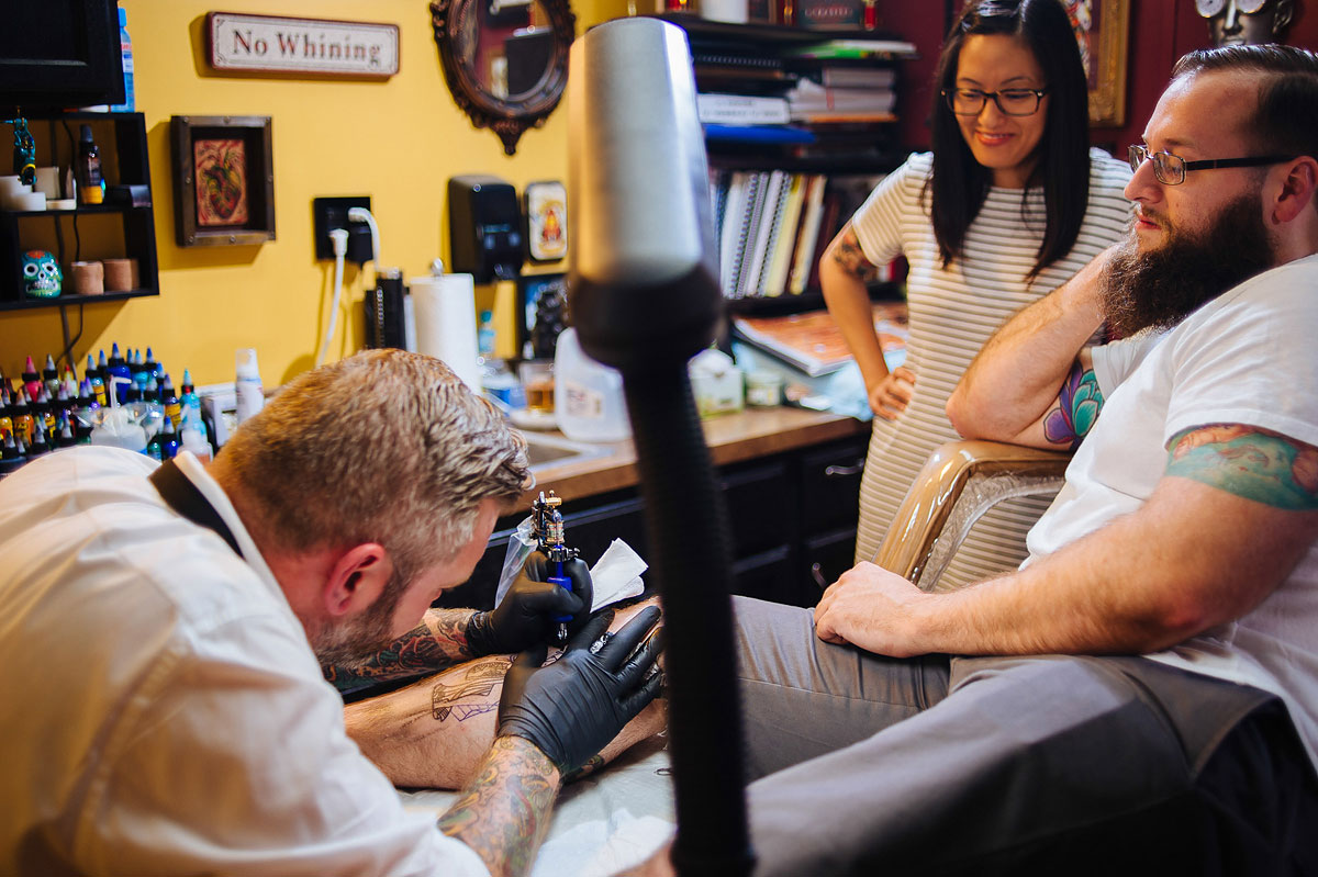 engagement session at tattoo parlor