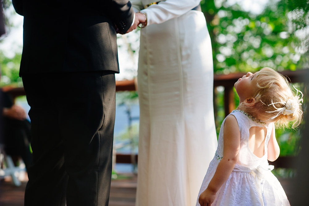 little girl watching mommy and daddy get married