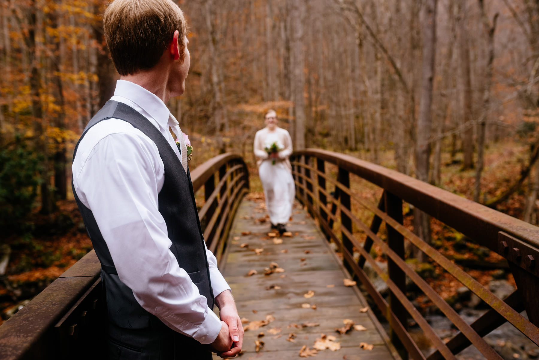 bride entering ceremony on bridge wv hiking elopement