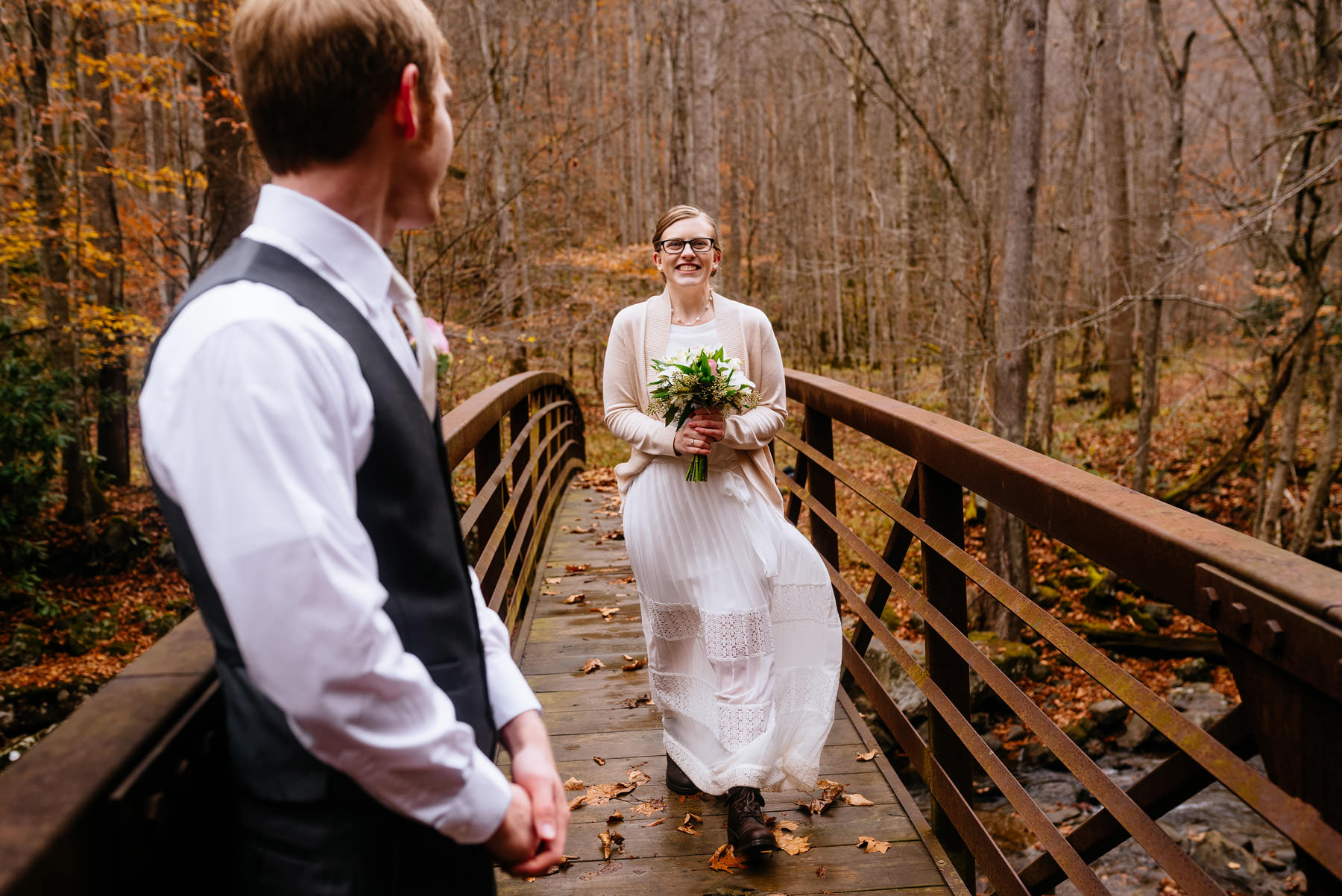 bride entering ceremony on bridge wv hiking elopement