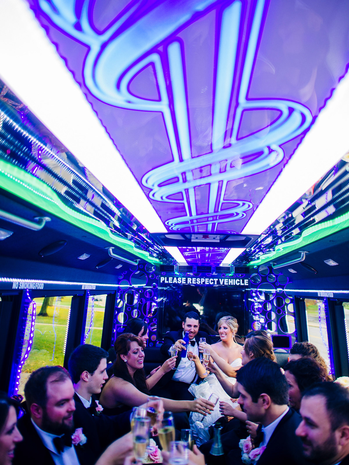 wedding party drinking in party bus