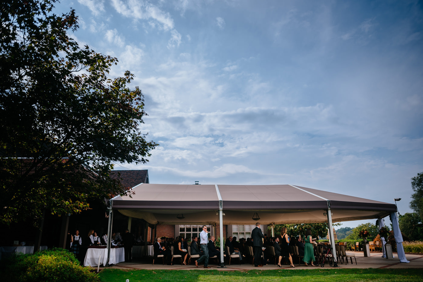 st clair country club wedding ceremony under tent