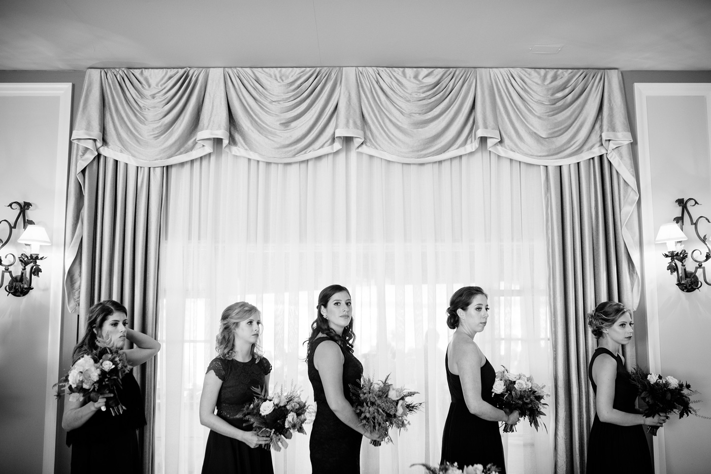 bridesmaids lined up for wedding ceremony