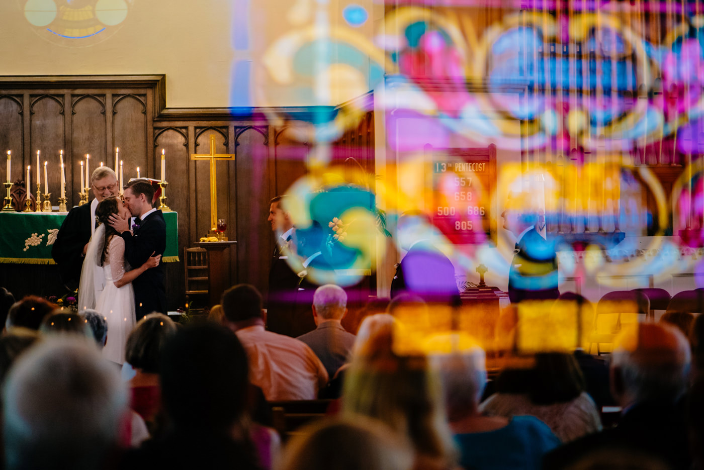 best wv wedding photography first kiss stained glass