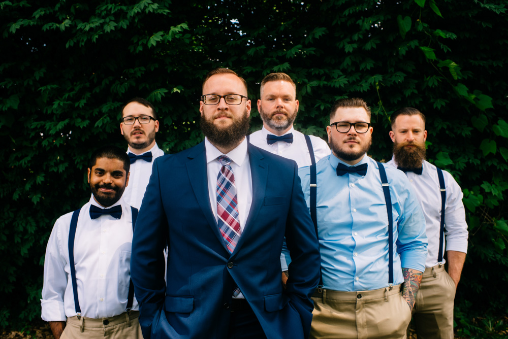 groomsmen with bowties and suspenders