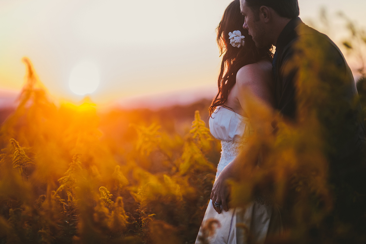 beautiful bride and groom portrait at sunset