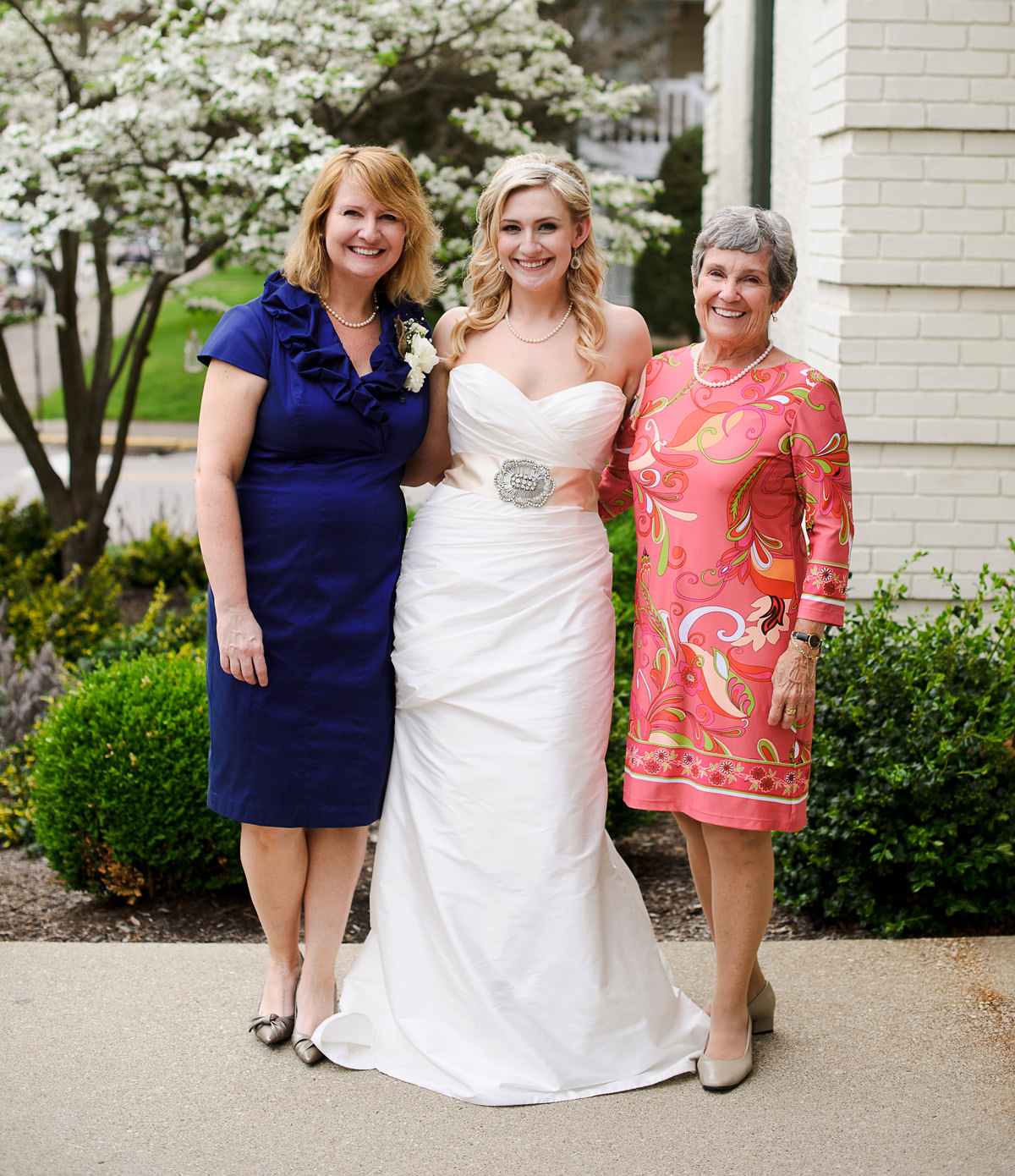 bride with mom and grandma