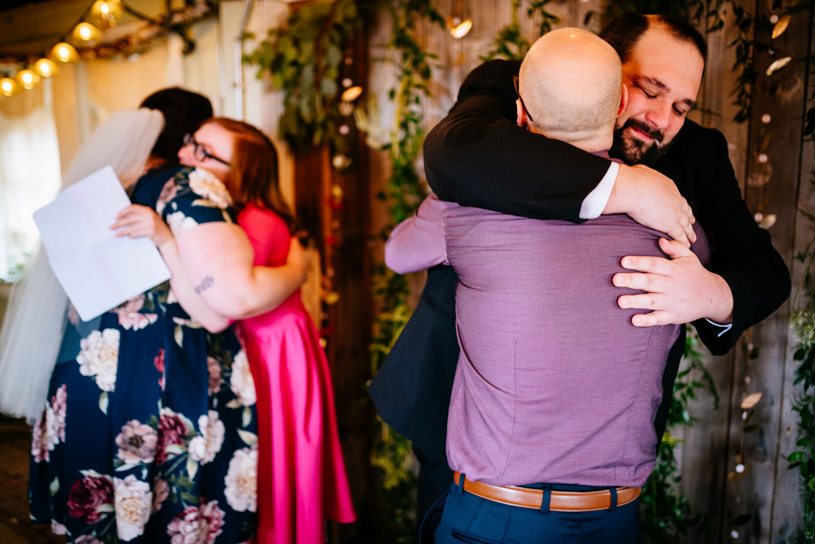 double hug after wedding ceremony