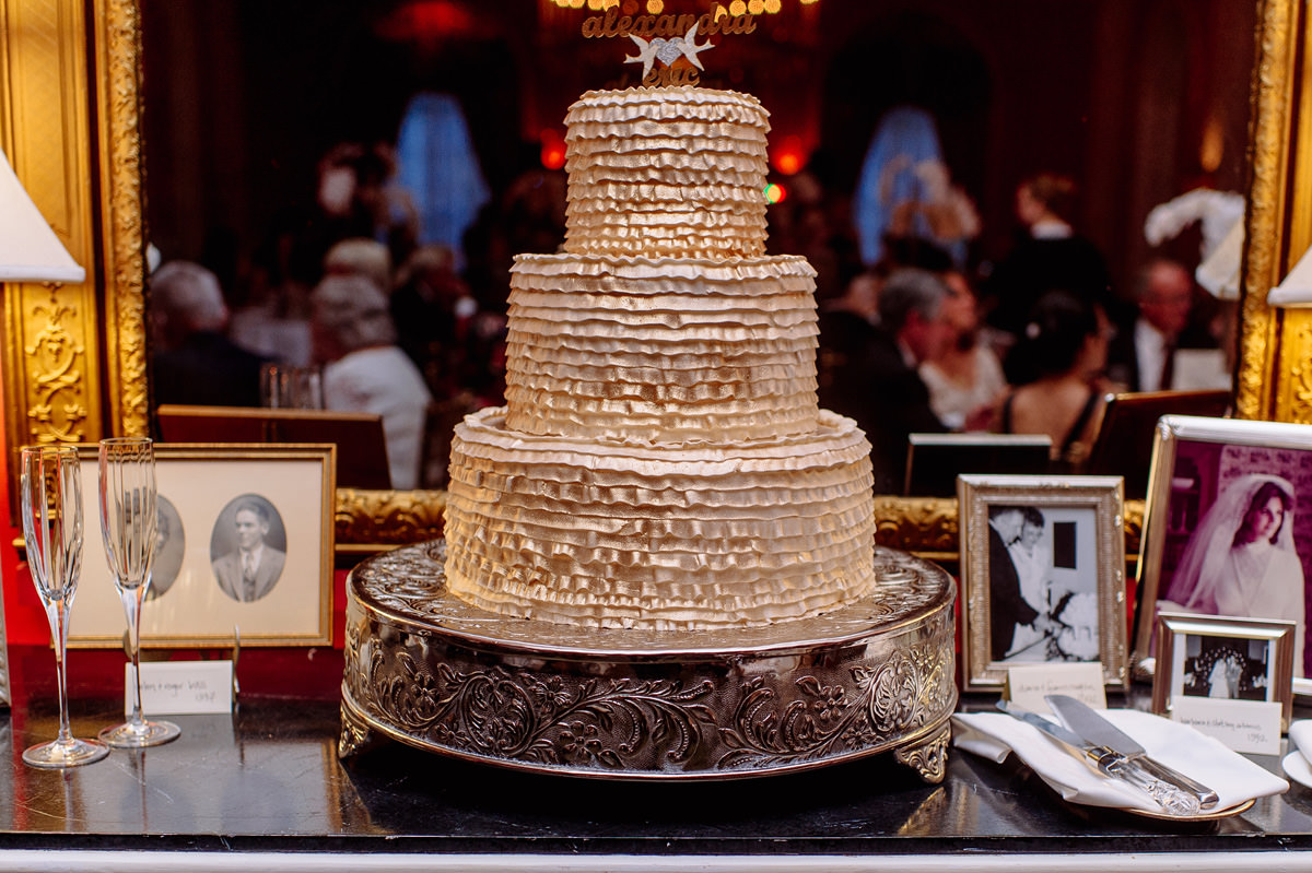 wedding cake with ruffles and gold