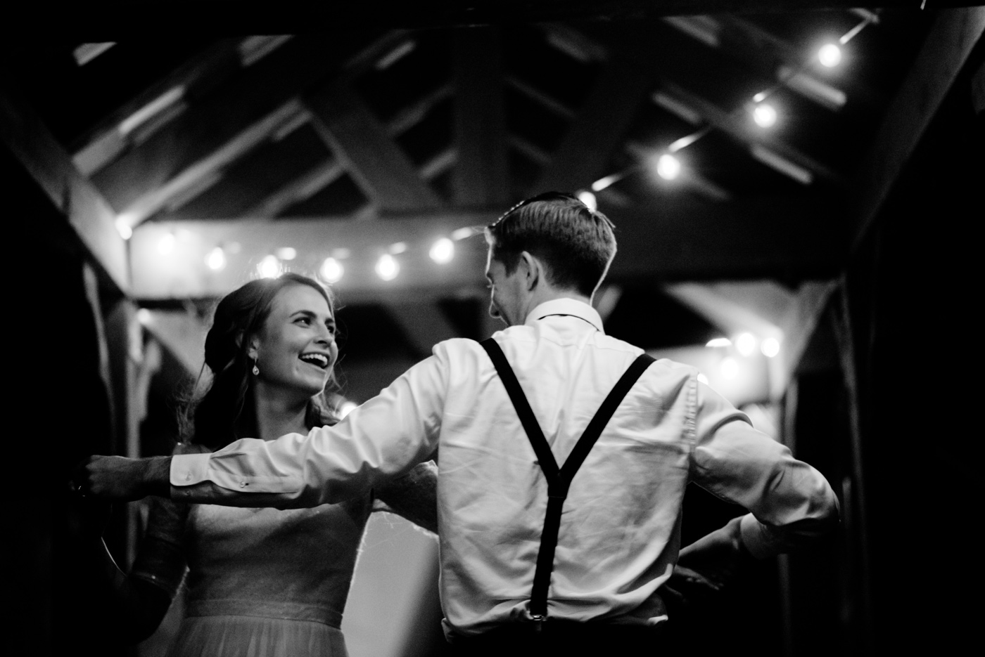 bride and groom dance alone at the end of the night