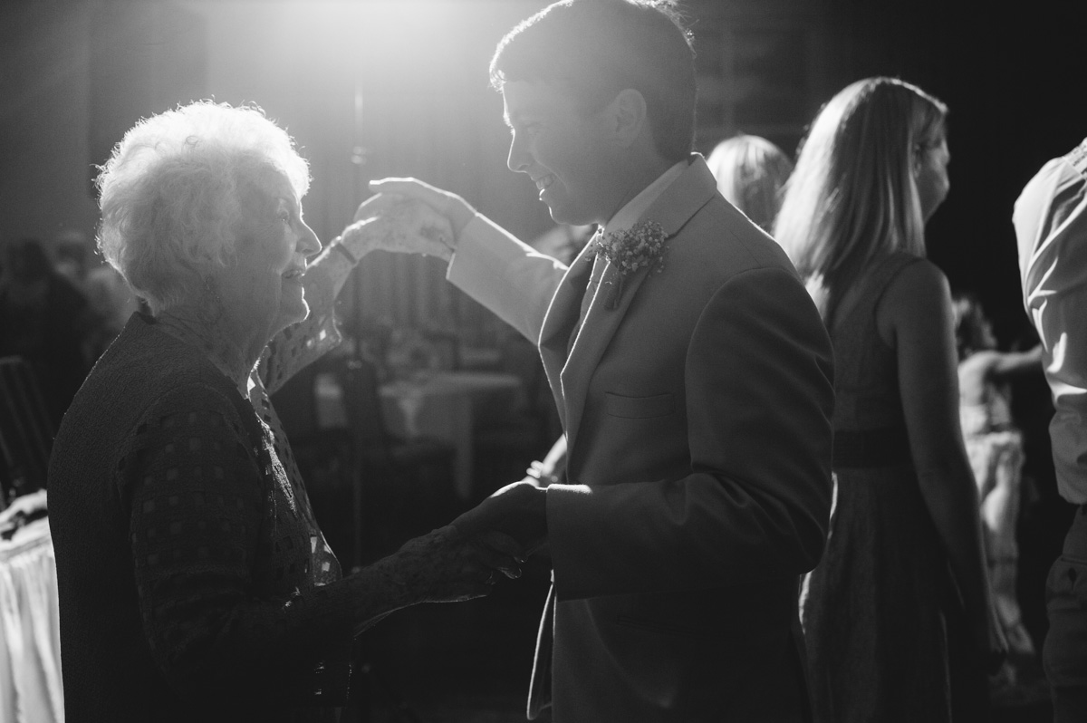 groom dancing with grandma