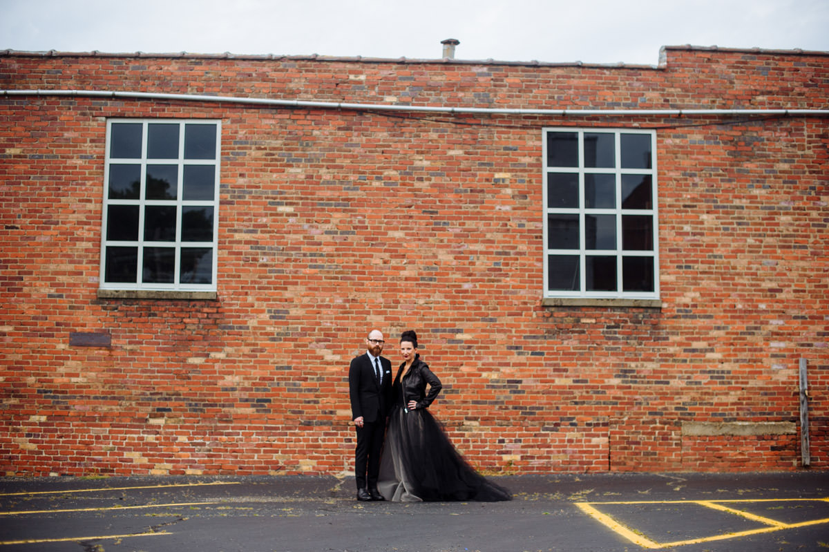 bride and groom portrait with rick owens stooges jacket by best wv wedding photographers the oberports