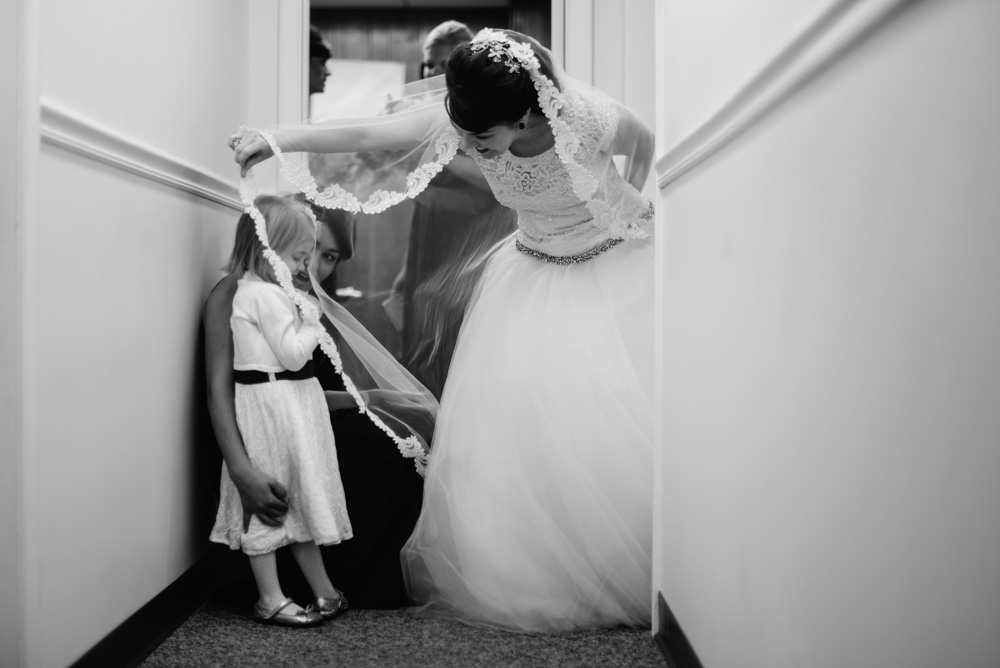 bride and flower girl wedding photojournalism by the oberports