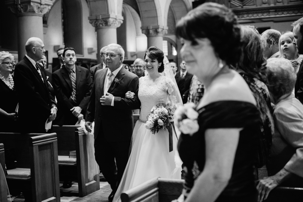 bride walking down aisle by best wv wedding photographers the oberports wheeling