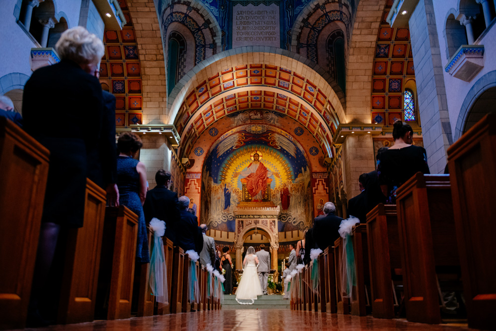 artistic wedding ceremony photos at saint josephs cathedral wheeling wv
