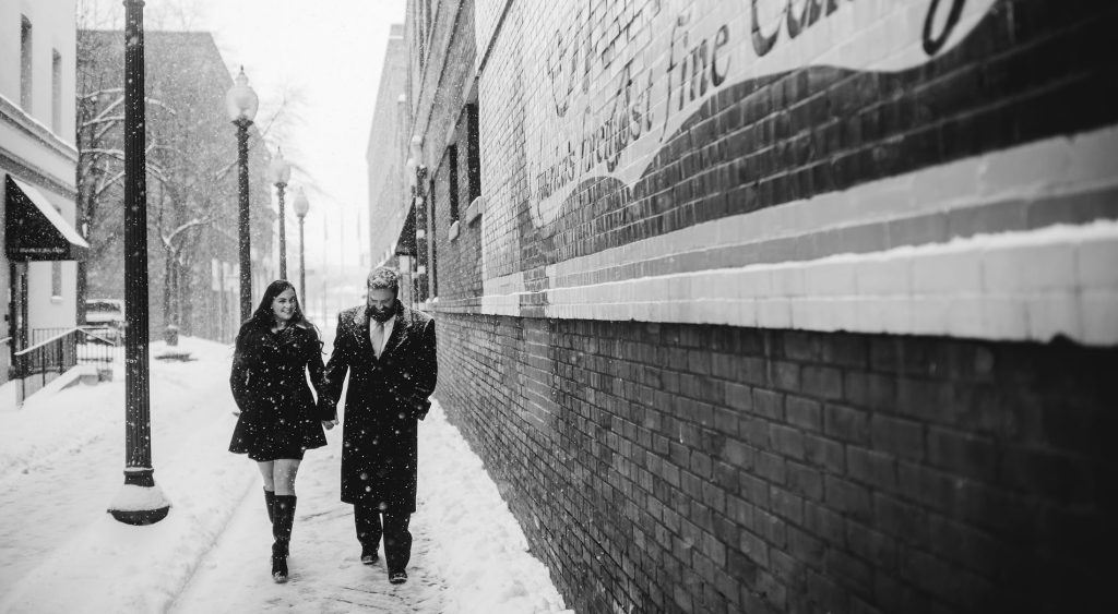 epic snowy downtown charleston engagement pics