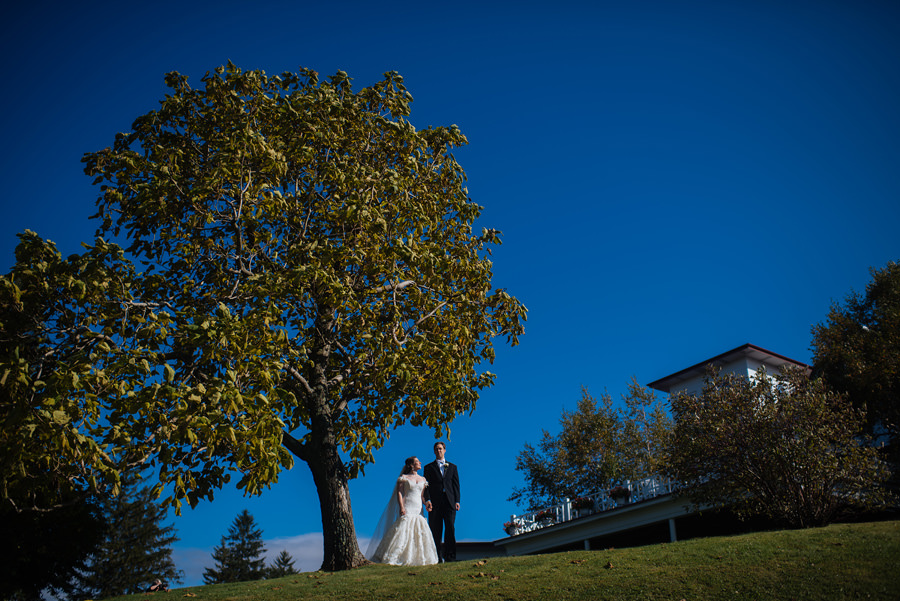 bride and groom in front of summit inn farmington pennsylvania