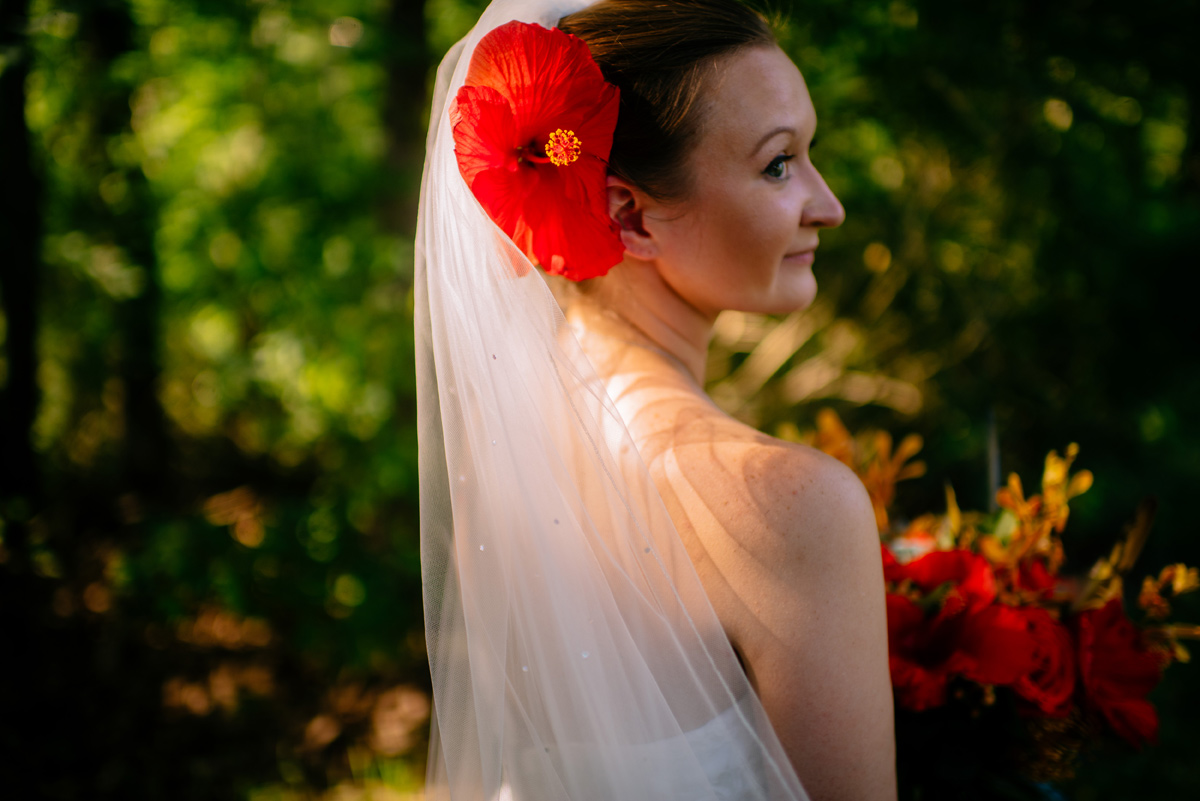 bride with hibiscus in her hair
