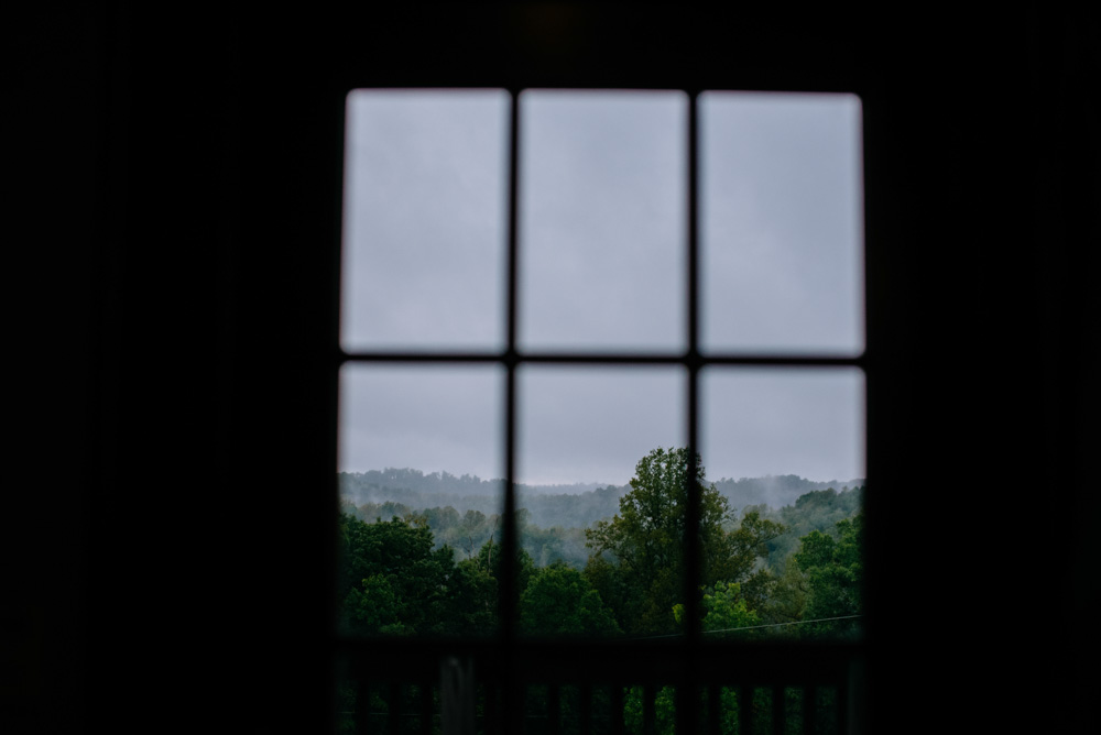 rain and fog on the mountaintop through window west virginia