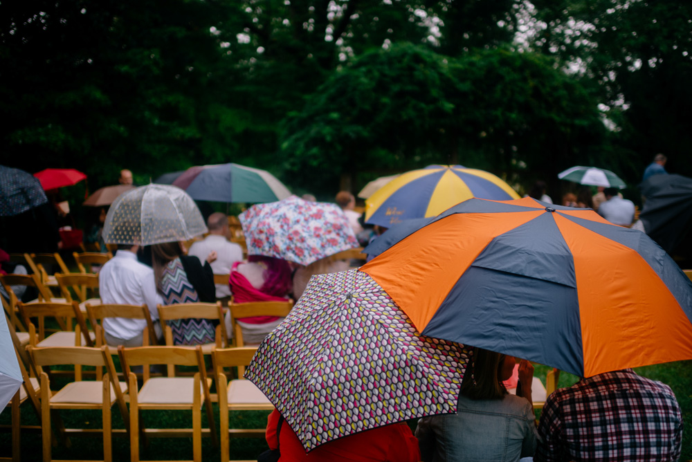 umbrellas rainy weding ceremony benedict haid wv