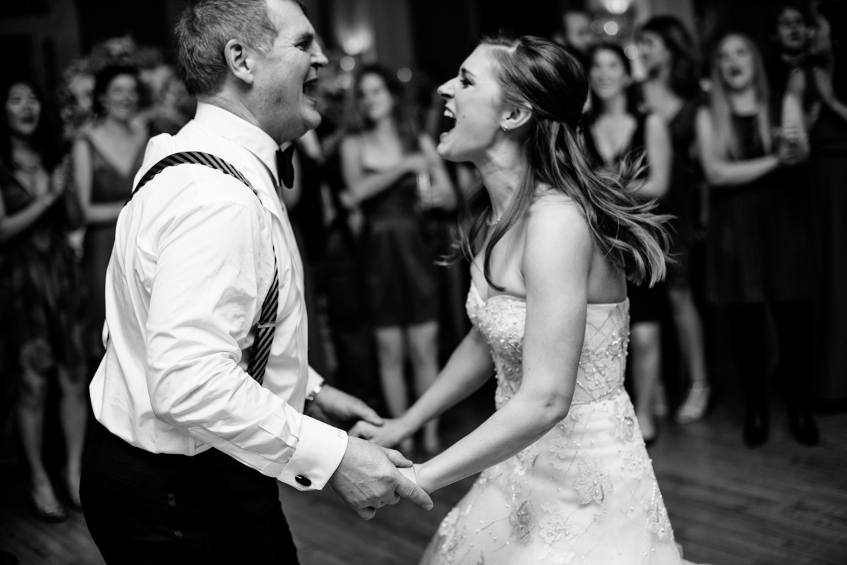 candid moment of bride dancing with her father at wedding reception at the greenbrier resort