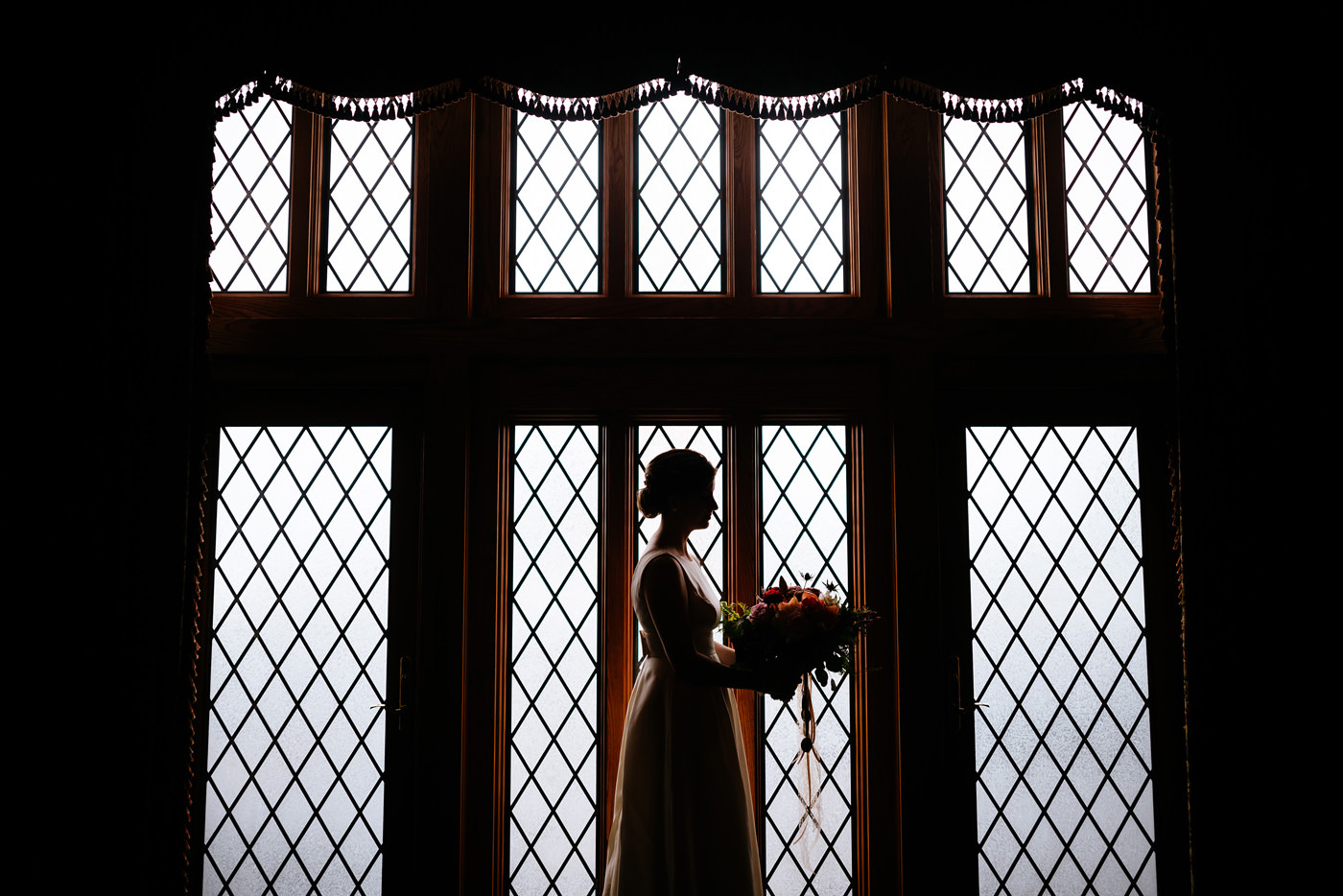 bride in front of cool window artistic bridal portrait pittsburgh pa wedding