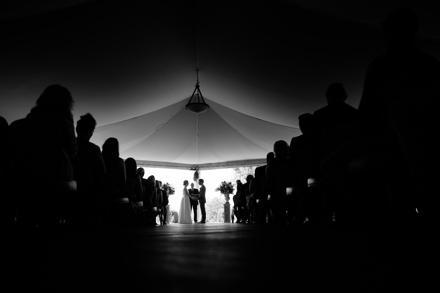 wedding ceremony under a tent
