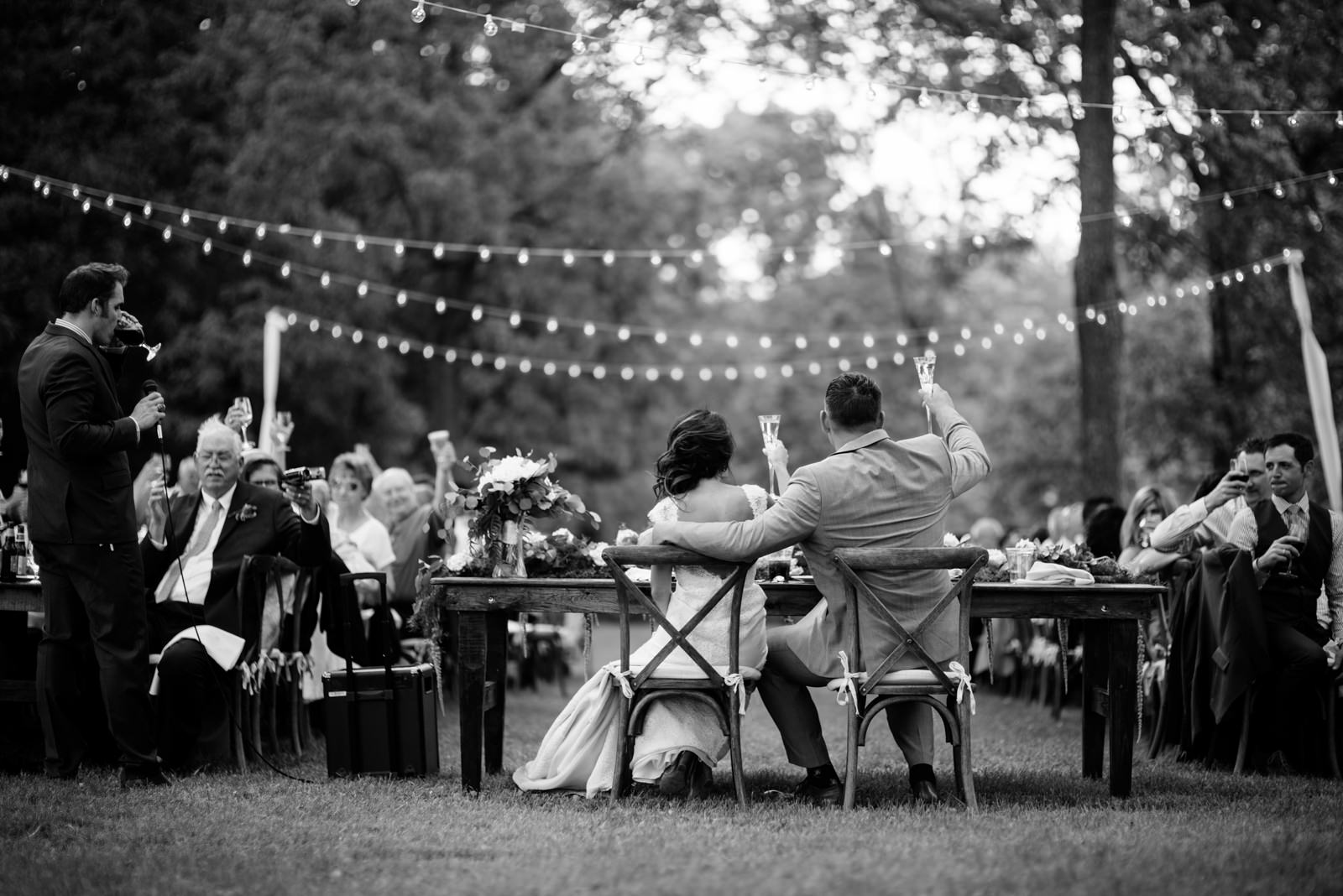 bride groom toasting during outdoor wedding reception gaines estate fayetteville wv wedding