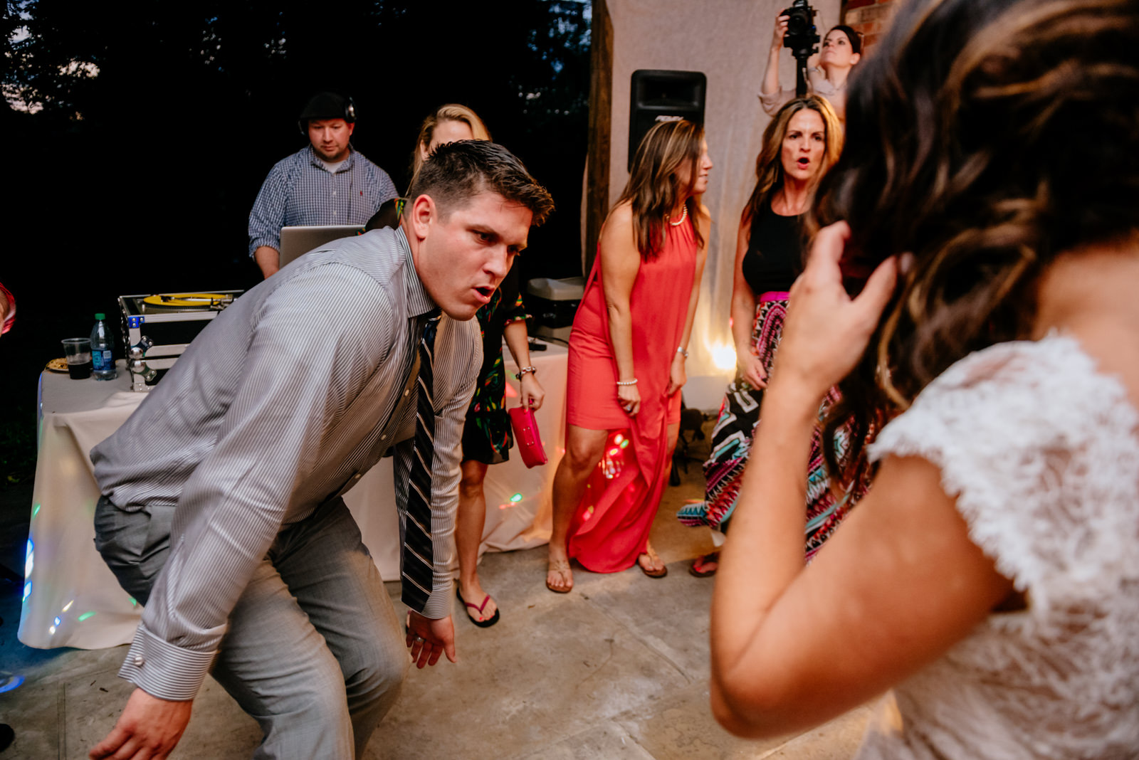 groom dancing wedding reception moment