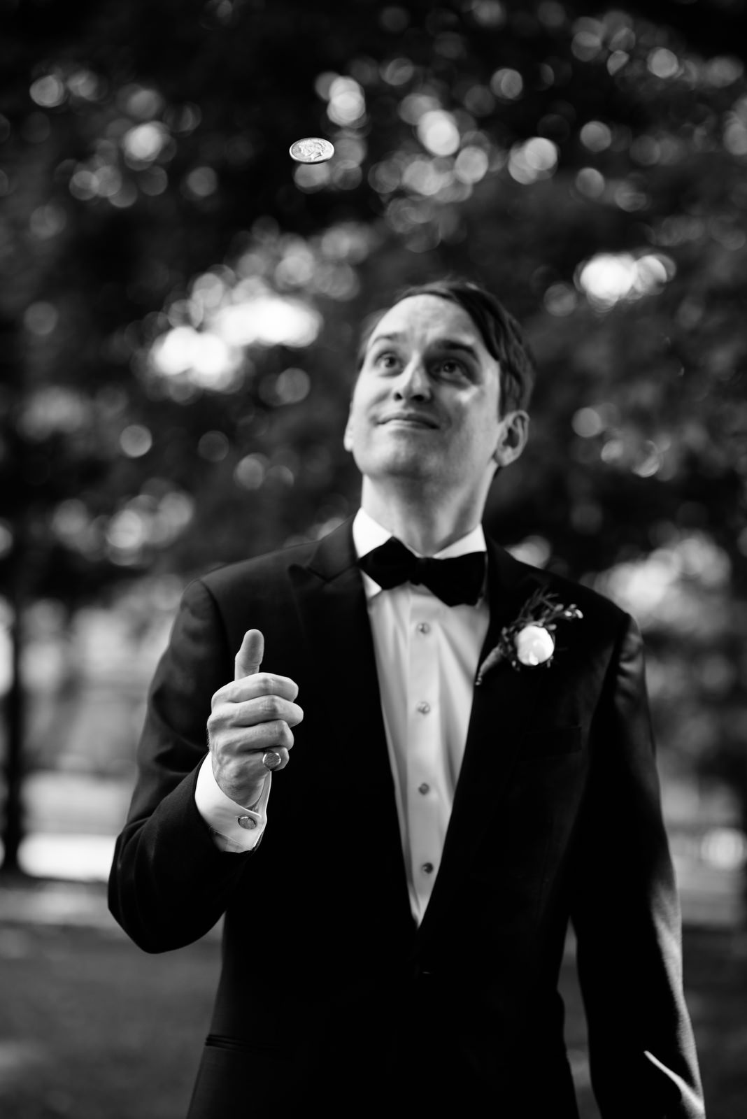 groom flipping grandmother half dollar coin