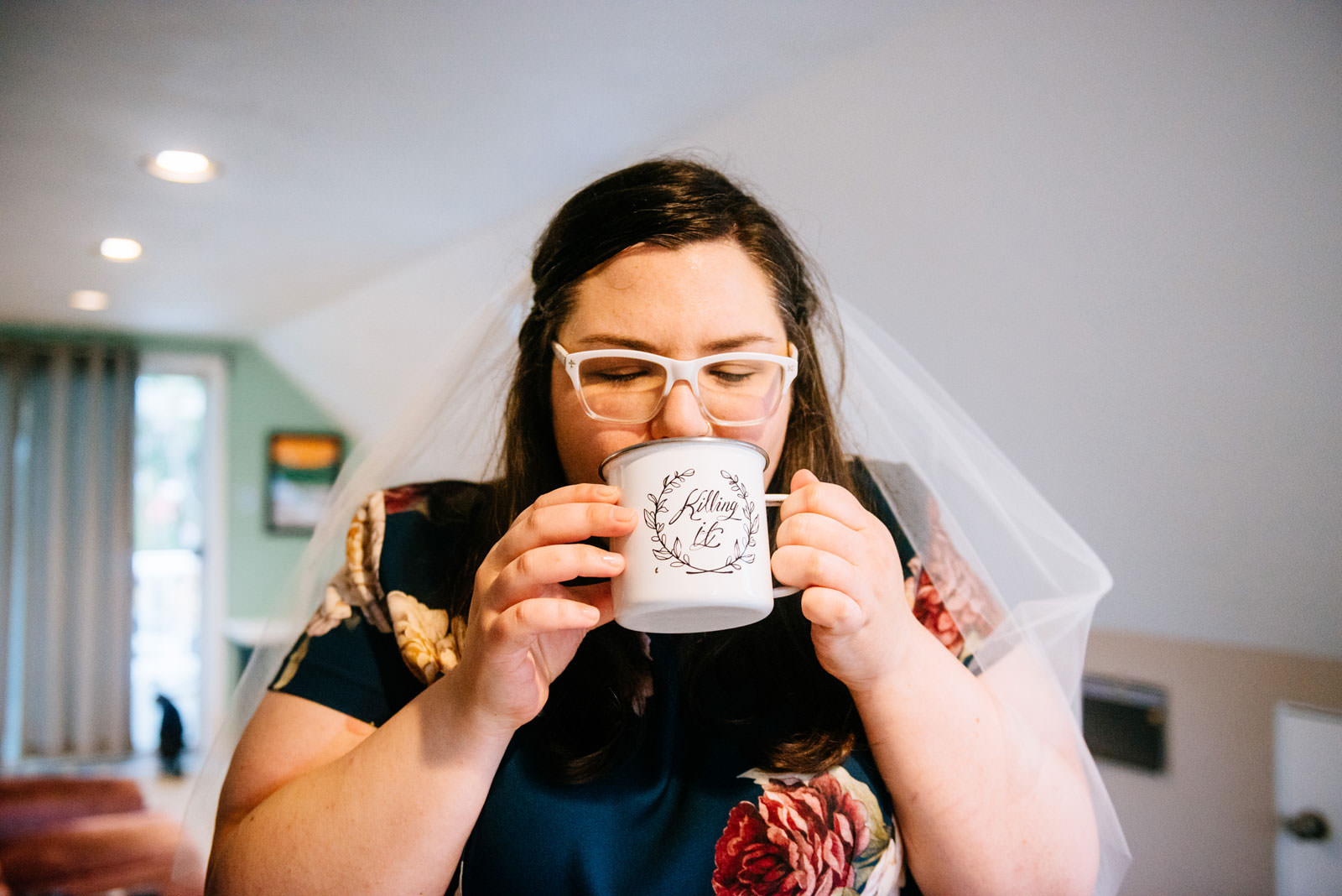 bride drinks coffee from killing it cup