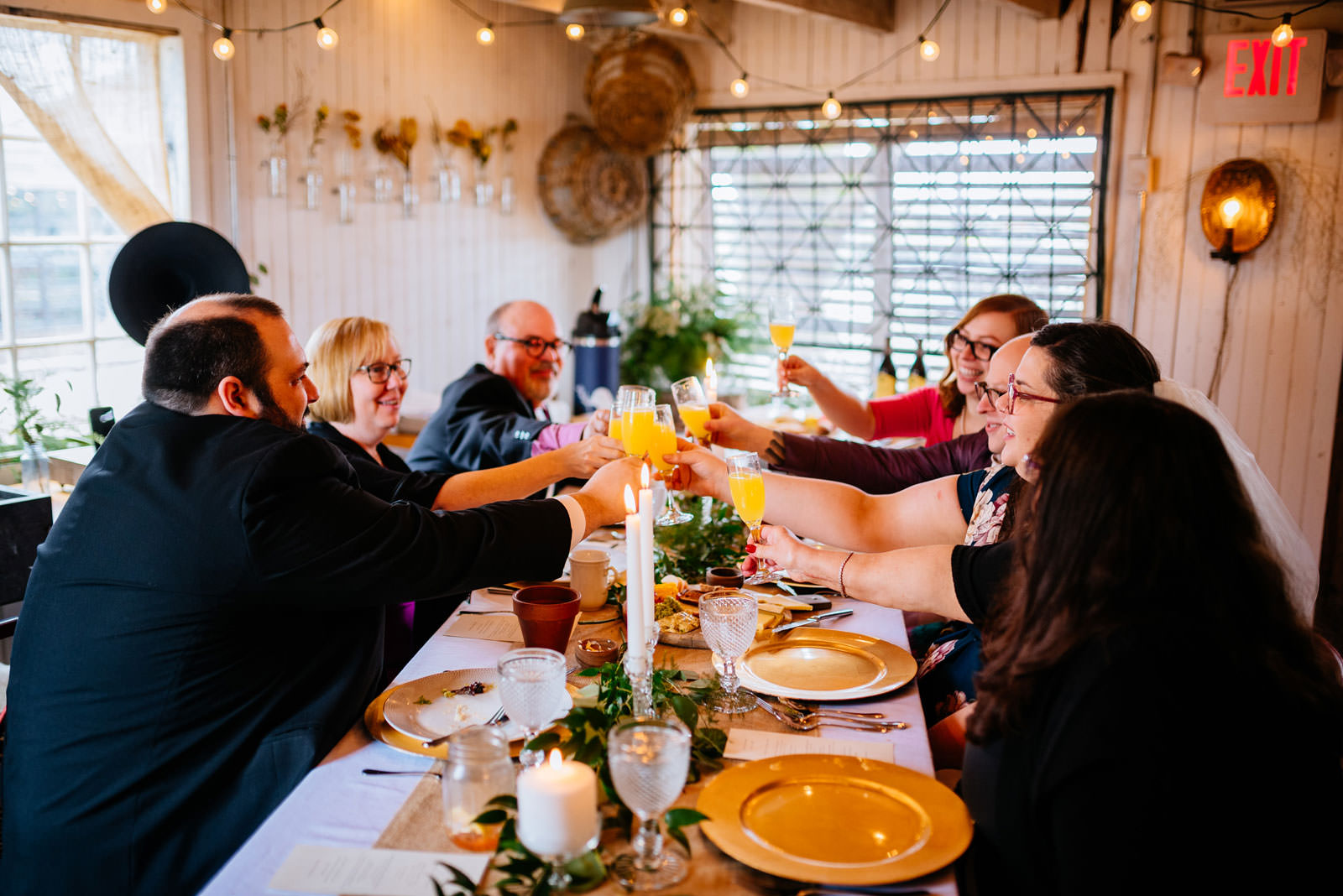 toasting mimosas terrain elopement family style brunch at mushroom house