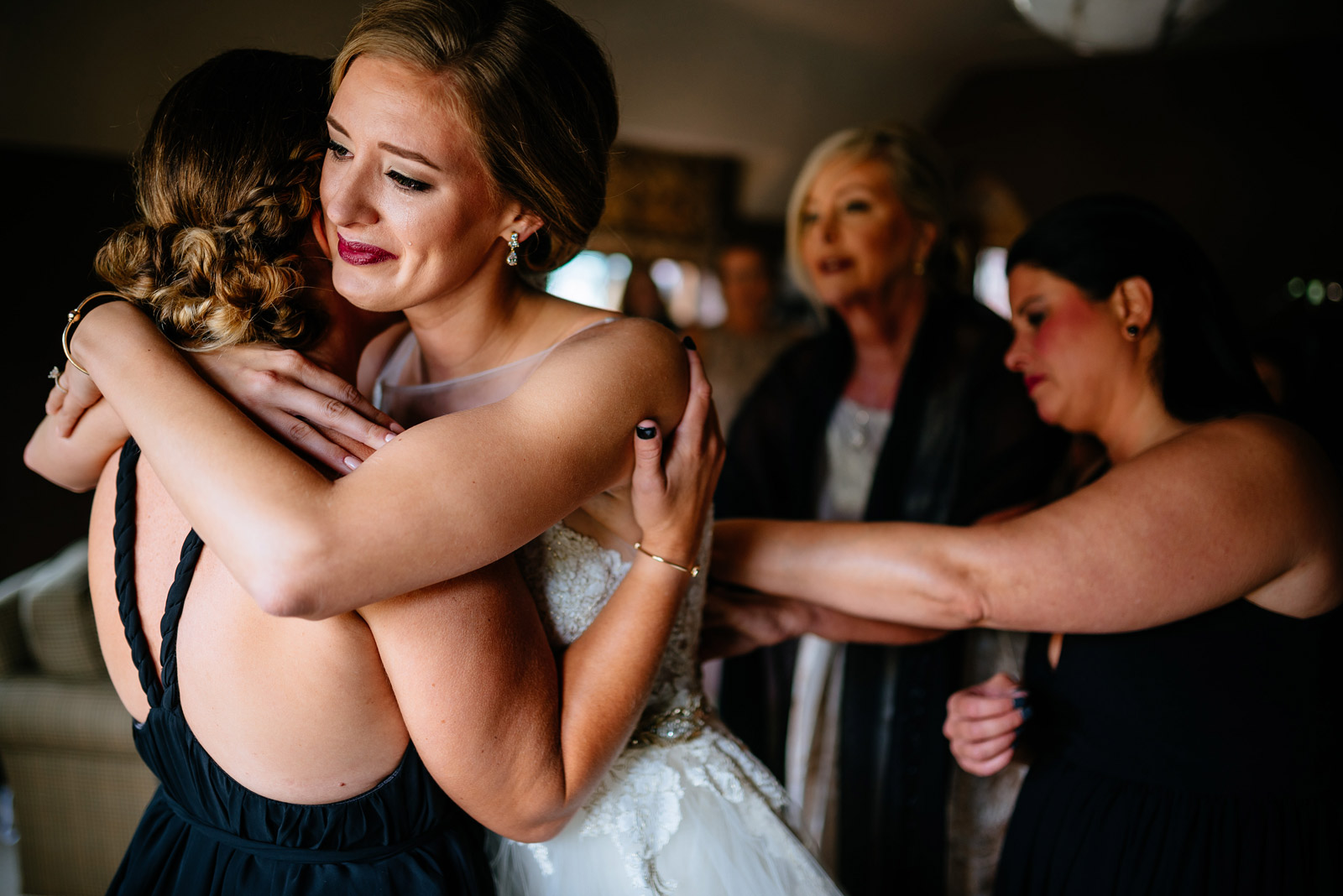 bride hugging bridesmaid zenner house wedding