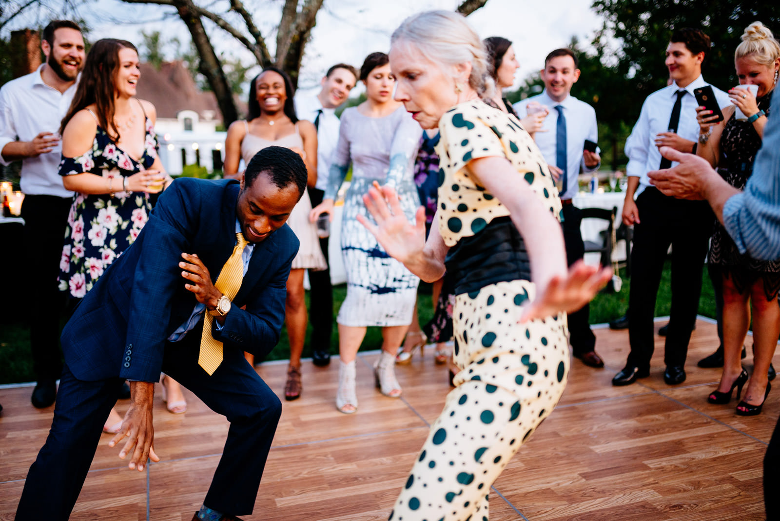 guests dancing during outdoor wedding reception