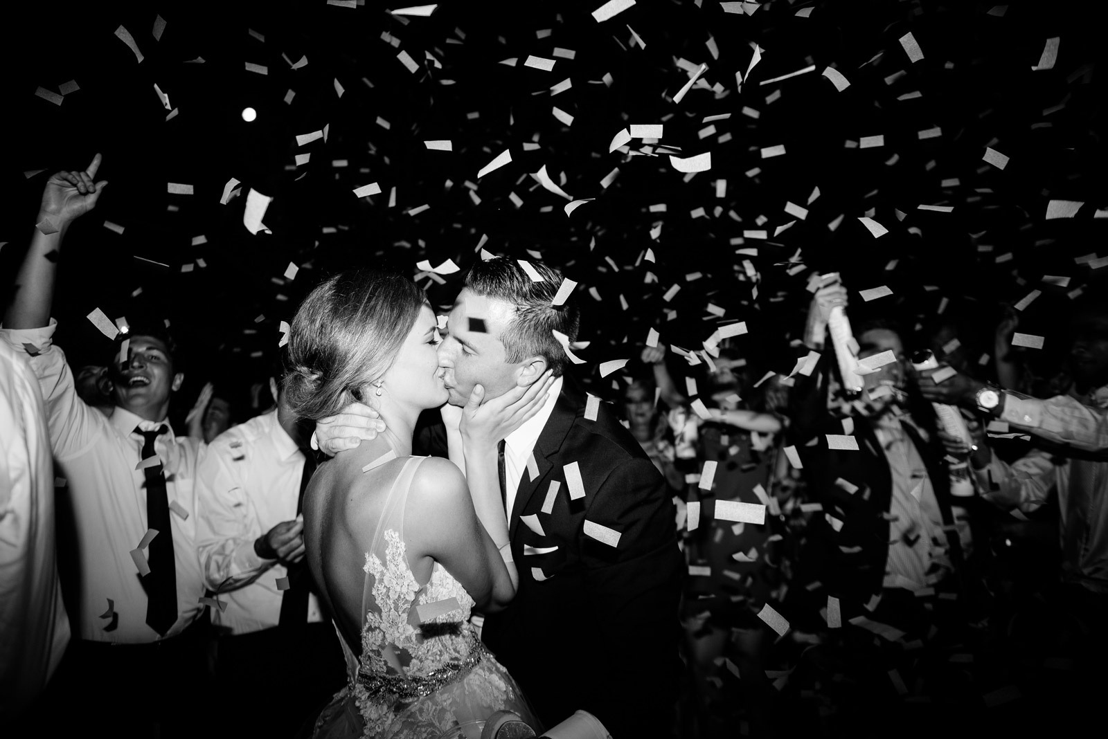 bride groom kissing confetti cannon zenner house wedding reception