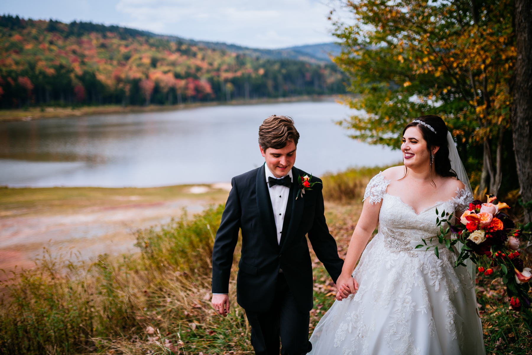 bride and groom walking snowshoe mountain resort wedding