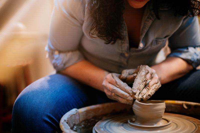 Close up of someone doing pottery.