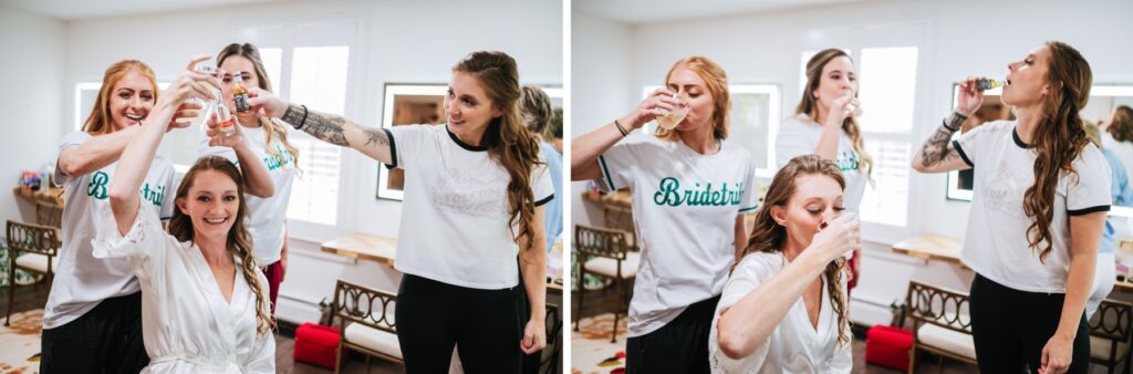 bride and bridesmaids taking a shot
