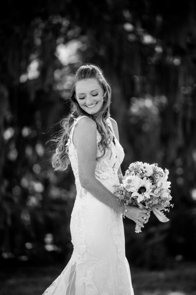 bride laughing in black and white