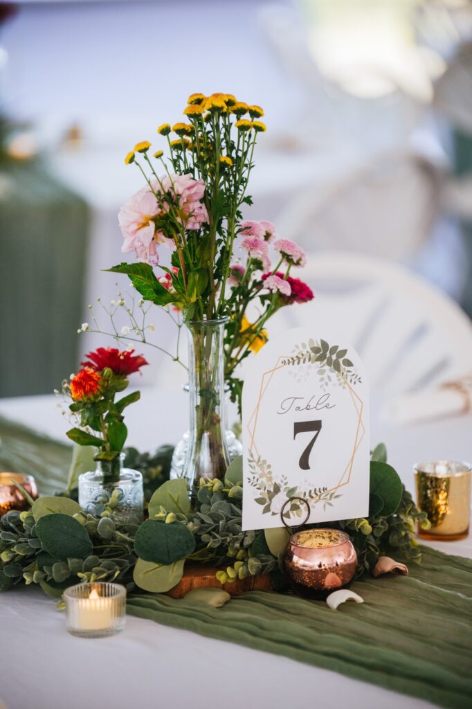 floral details on the table settings at batten green wedding