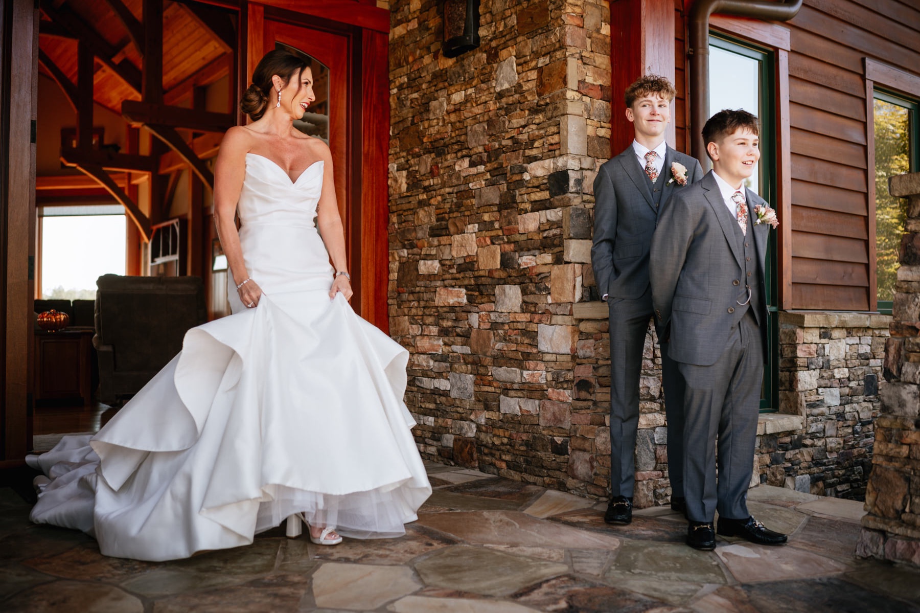 Melissa sharing a first look with her sons on her wedding day at the Wilderness Lodge in Summersville WV.